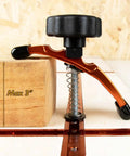 Side view of Positionable T-Track Hold Down Clamp Kit for CNC routers holding a 3-inch thick block, 6063-T5 aluminum, easy-grip knob