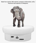 Premium Electric Rotary Turntable With 360 Smooth Spin For Jewelry And Watch Display Featuring Adjustable Speed USB Power And Strong Six Point Six Pound Load Bearing Capacity For Killer Photography Setup with an elephant on top.