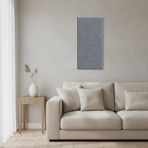 Straight Up Six Piece Soundproof Wall Panels With Flat Profile Acoustic Foam Tiles For Legit Noise Reduction In Living Rooms And Bedrooms Silver Gray setup on wall beside light sofa.