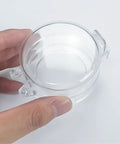 Close-up of 2 Pack Clear Deadbolt Lock Safety Covers For Glass Doors, Transparent Sticky Protector, Kid Safe And See Through