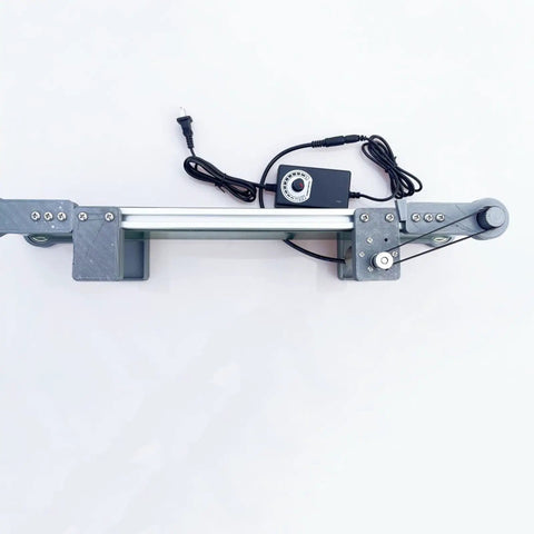 Compact Portable Automatic Belt Conveyor Table For Smooth Factory Lines With Anti Static Durable Pvc Moving Belt seen from above with control panel.