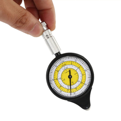 Map Measurer Metal Wheel Outdoor Navigation Tool for Camping Hiking Cycling held in hand with metallic details and yellow scale.