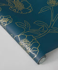 Peacock Blue And Metallic Gold Peonies Floral Peel And Stick Wallpaper Removable Self Adhesive Rolls For Easy Diy Wall Makeover With A Boss Look In Bold Luxury Style 20.5 Inch By 16.5 Foot Made In USA rolled out showing detailed gold peonies pattern on blue.