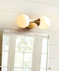 Two Light Wall Sconce For Bathroom Vanity And Mirror Front Light With E27 Socket, Round Glass Shade, Copper And Glass Finish