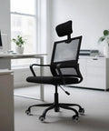 Heavy Duty 28 Inch Office Chair Base Replacement For Most Chairs 2400 Lbs Capacity Matte Black Metal Legs With Universal Casters Sockets installed on a swivel chair in an office setting.