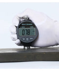 Heavy Duty Digital Durometer Hardness Tester Meter Showing Type A D C Scale Perfect For Tire Rubber Plastic Foam Shop Floor Precision Gauge Tool Delivering Straight Up Accurate Measurements Daily measuring hardness on rubber surface.