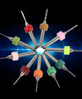 Ten Piece Set Of 0.6 To 1.5mm Pro Grade Carbide Drill Bits arranged in a star shape, colored holders, for PCB CNC Milling and Circuit Board Drilling