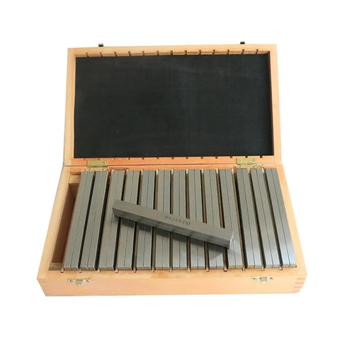 Dead On Precise 28 Piece Gauge Block Set Featuring Engraved Setting Strips For Real Woodworkers Router Truing Jigs And Table Saw Calibration Tools Built Solid For Shop Work in wooden case with open lid.