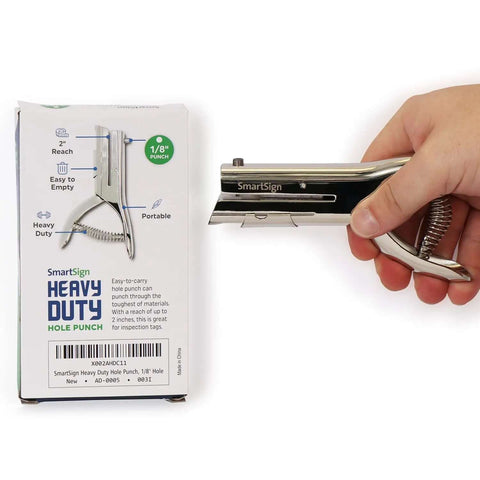 Heavy Duty Handheld Workhorse Single Hole Punch With 1/8 Inch Punch And 2 Inch Reach held next to packaging
