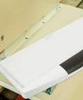 Heavy Duty Sliding Keyboard Tray With Built In Pen Slot And Slick Silver Glide Rails For No Sweat Under Desk Organization and Your Best Ever Office Setup Upgrade, white tray installed under desk.