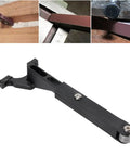 Knockout Belt Sander Attachment For Angle Grinder, Bandfile Conversion Kit With 20 Premium Grit Belts, showing durable black aluminum body.