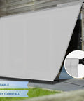 12x12 Ft Outdoor Shade Canopy Cover Waterproof UV Blocking With Grommets And Weighted Rods installed on patio deck