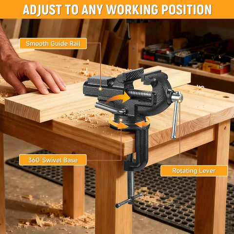 2-Inch Universal Table Vise With 360 Degree Swivel Base, Must-Have Portable Clamp-On Workbench Vice With Built-In Anvil For Hobbyist Jewelry Making, Electronics, Woodworking, And Precision DIY Projects. Clamped to a wooden workbench with rotating lever.