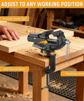 Crush Your Workshop Goals With This Smooth Portable Table Vise Featuring A 360 Degree Swivel Base Built In Anvil And Killer Grip For Jewelry Woodworking And Precision Electronics Crafts on a workbench cutting wood.
