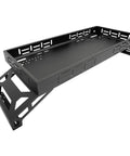 Badass Universal UTV Overbed Cargo Rack With Adjustable Mounting Brackets That Install Fast And Fit Most Side By Side Beds For Zero Headache Gear Storing, side view showing black steel construction.