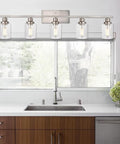 40 Inch Brushed Nickel Vanity Light Over Mirror Five Light Industrial Sconce Wall Lamp With Seeded Glass Shades For Bathroom Living Room And Hallway Modern Farmhouse Style That Adds A Dope Warm Glow above a kitchen sink