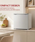 1.1 Cu Ft Compact Mini Freezer Solid Upright Build Slides Right Into Tight Dorm Rooms Or Offices Storing Meats Fresh Fish And Ice With Zero Hassle Cooling Tech in a modern kitchen setting.