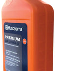 X Guard Premium All Season Mineral Bar And Chain Oil For Chainsaws, 1 quart bottle, orange and blue packaging.