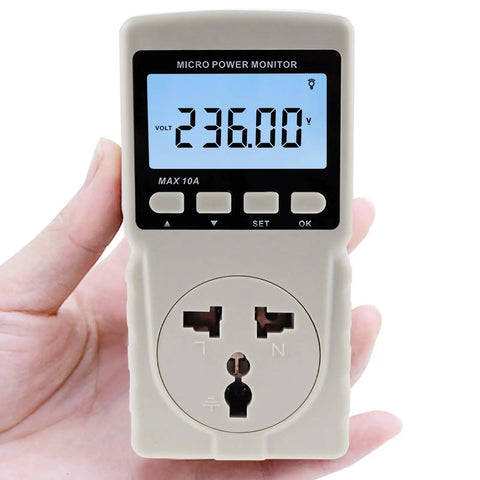 Plug In Watt Meter Spot Energy Suckers And Cut Your Electric Tab Fast With This Badass Home Energy Monitor gauging volts in hand.