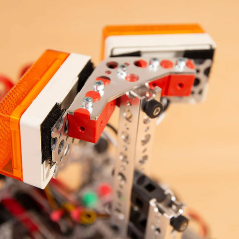 Heavy Duty Kickass Aluminum 120 Degree Robot Gusset installed on a TETRIX structure, enhancing rigidity for robots.