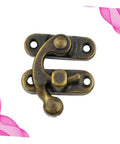 Close-up of a gold finish latch from a 30 Piece Wooden Box Buckle Hasp Latch Hardware Kit For Hold Down Clamps And Toggle Latch