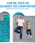 Three Season Camping Sleeping Bag For Adults And Kids Lightweight Weatherproof And Waterproof Warm In Cold Nights Cool In Warmer Weather Must Have Outdoors Gear For Travel Camping Hiking And More shown as blanket with adult and child laying on it.