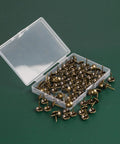 Top Shelf Upholstery Tacks And Furniture Pins For Decorative Fabric Fastening 100 Pack in clear box, antique bronze finish.