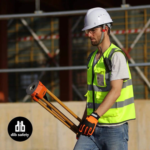 Man wearing High Visibility Reflective Safety Vest For Men And Women, ANSI Class 2, Yellow With Durable Zipper, on construction site