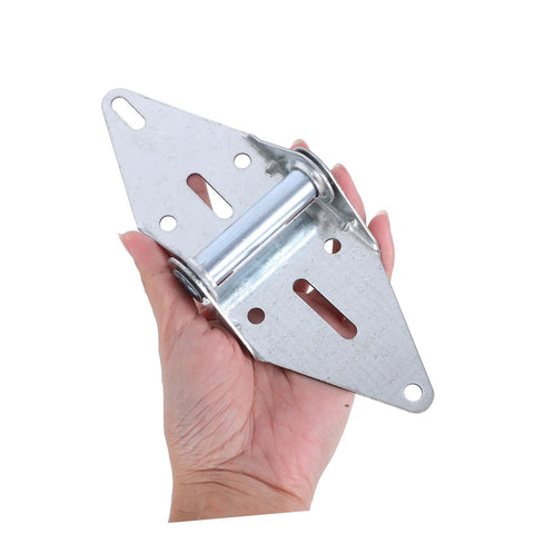 Garage door hinge bracket made of galvanized steel; handheld view shows triangular plate with multiple mounting holes.