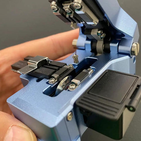 Boss Level Mt 09 Fiber Cleaver Automatic Cable Cutting Knife For Ftth Installations, showing blade and clamps in a blue housing.