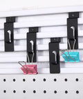 Black slatwall notch hooks for pegboard holding colored clips. 50 Pack Stainless Steel Slatwall Notch Hooks For Panels.