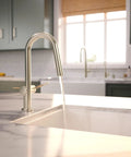 hansgrohe Talis N Pull Down Kitchen Faucet, Modern, Magnetic Hand Sprayer, 1-Handle, 1.75 GPM, Polished Nickel, 72866831, close-up at sink.