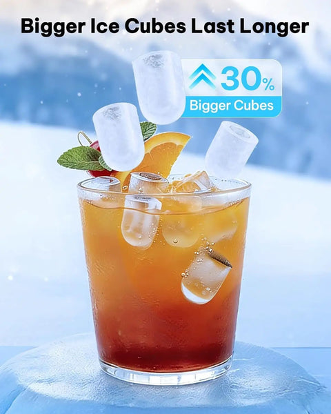 Self Cleaning Countertop Ice Maker Slams Out Bullet Ice In Six Minutes Whisper Quiet Operation Keeping Your Kitchen Vibes On Deck And Your Cooler Loaded For Weekend Hangouts Without Breaking The Bank. Ice cubes floating in drink with orange and mint.