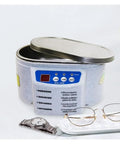 Massive 30 50 Watt Digital Ultrasonic Cleaner Bath For Jewelry And Glasses with a watch and eyeglasses displayed.