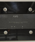 Flush Mount Plate For Whole House Surge Protection Device On Drywall, Black Acrylic Finish, with screws and washers installed.