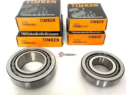 Four TIMKEN bearing boxes (25580, 25520, 14125A, 14276) with two large metal roller bearings in front