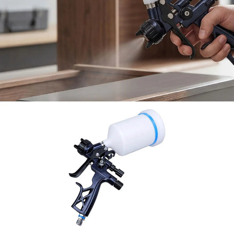 Nail Your Paint Project With This Hella Smooth Gravity Feed HVLP Spray Gun Featuring A Slick 1.7Mm Nozzle And Spiffy 600Ml Reusable Cup For Guaranteed Top Shelf Finishes, close-up of spray gun in use.