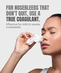 BleedStop Nosebleed Strips foam inserts for rapid clotting; front-view of woman pressing tissue to her nose.