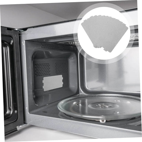 Microwave Mica Heat Resistant Insulation Plates Set Of 2 With 12 Sheets Per Pack shown inside microwave oven