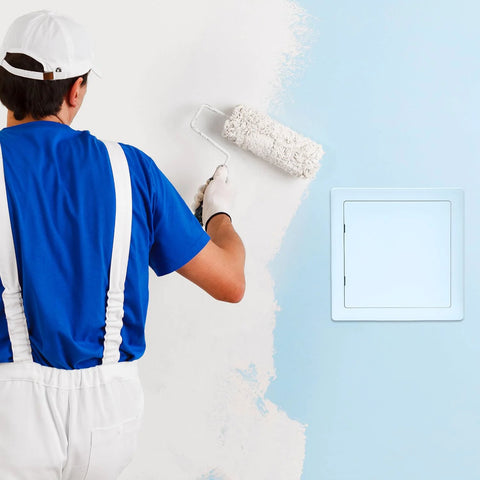 QWORK 10x10 inch plastic drywall access panel side view on blue wall beside painter applying white paint