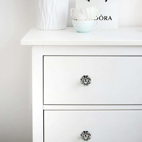Chrome Flower Drawer Knob Set Zinc Cabinet Pulls 4 Pack with 3 screw sizes on white dresser.