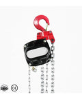 Sturdy One Ton Manual Pulley Chain Block Hoist Crane Lifting Machine With Durable Black Finish For Heavy Duty Garage Jobs And Warehouse Work showing red hook and black housing