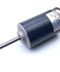 High speed mute permanent magnet DC motor with 52mm frame and 8mm shaft for robotics or automation gear projects.