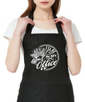 I'll Be In My Office Garden Lover Apron For Women And Men worn by woman, black waterproof oil-proof poly-cotton with white print.
