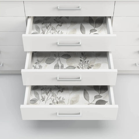 Open drawers lined with Breezy Peel And Stick Botanical Wallpaper In Gray, Removable Self Adhesive Wall Covering For Easy Install.