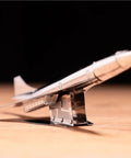 Concorde Supersonic Cargo Aircraft Model Kit For DIY Builders Assemble 3D Airplane Working Model 7 Piece Metal Kit on table