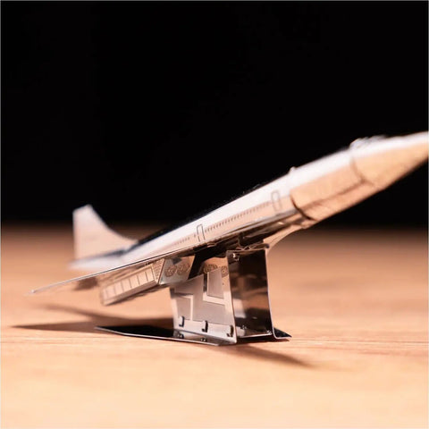 Concorde Supersonic Cargo Aircraft Model Kit For DIY Builders Assemble 3D Airplane Working Model 7 Piece Metal Kit on table