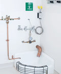 Commander Wall Mount Service Sink Faucet With 8-Inch Centers, Rough Chrome Finish, visible over a utility sink.