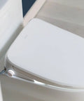 Top Shelf Elongated Bidet Toilet Seat In Crisp White With An Ultra Low Profile Setup and warm water features visible.