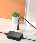 24V AC DC Power Adapter Replacement For MW GST60A24 GST60A24P1J Mean Well 24VDC 2.5A 60W on desk with power outlet